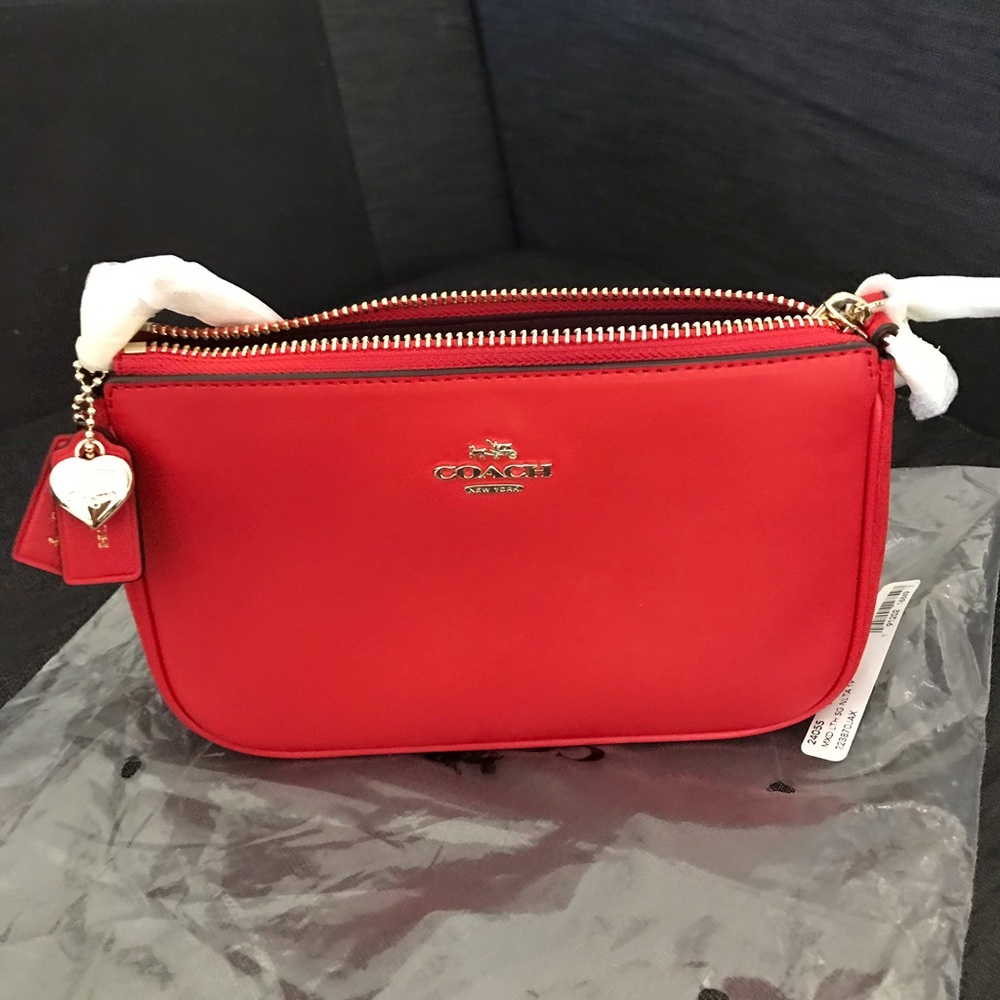 COACH
Selena Gomez Wristlet 19 In Mixed Leathers